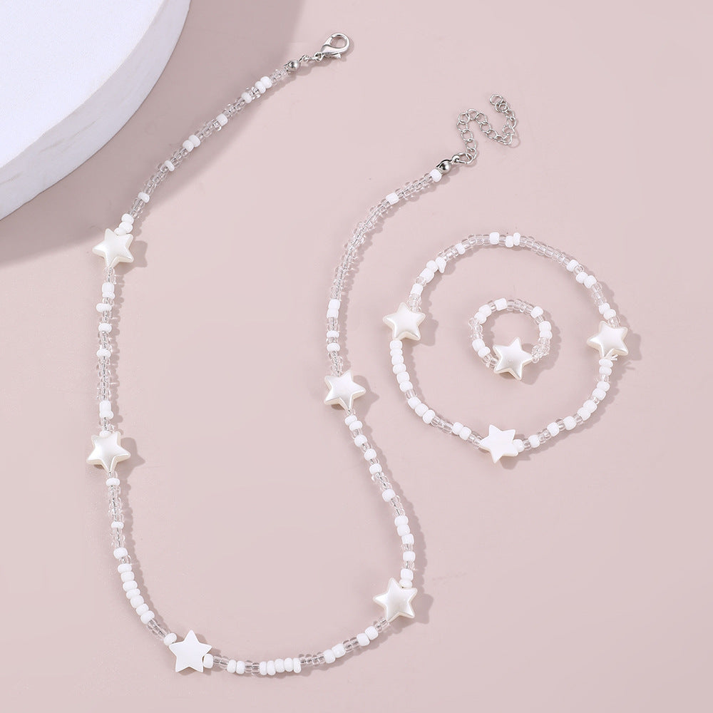 Set di collana con perline in resina a forma di stella, bracciale e anello per bambini, regalo di gioielli minimalisti fatti a mano