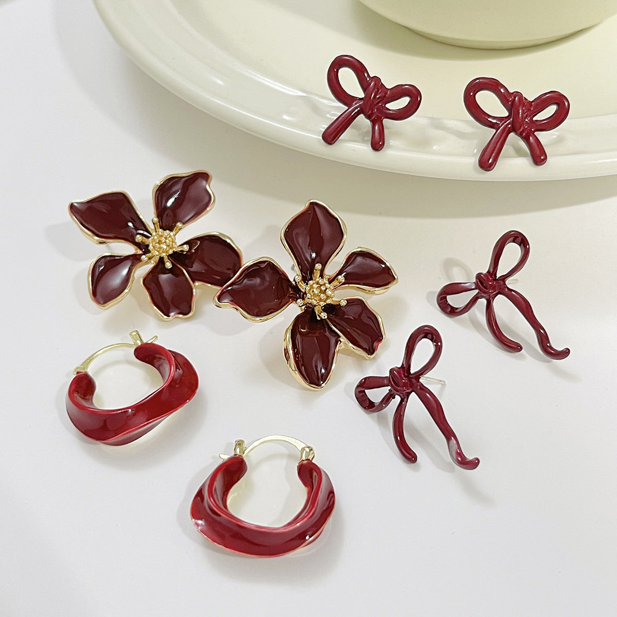 Minimalist Floral Bow Earrings for Women with Enamel Finish in Alloy Metal