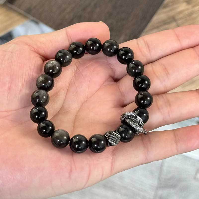 Bracciale Geometrico con Perline di Ossidiana Nera, Montatura in Rame e Accenti di Zirconi, Accessorio Moda Unisex per Donna e Uomo