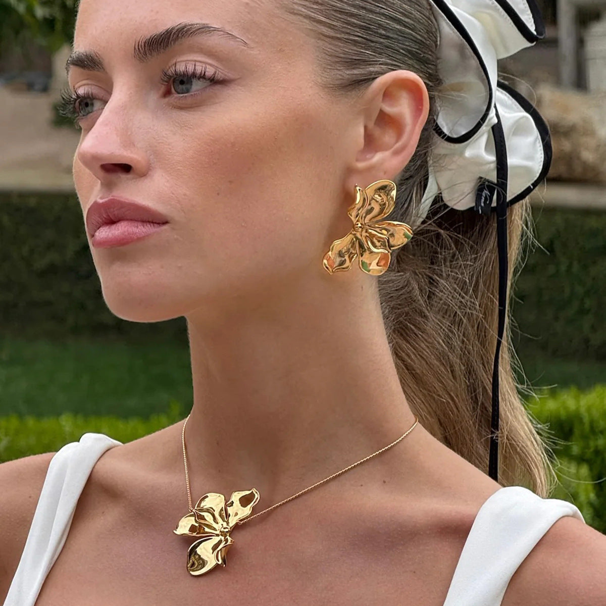 Eleganti orecchini in acciaio inossidabile con placcatura, motivo floreale geometrico, da donna