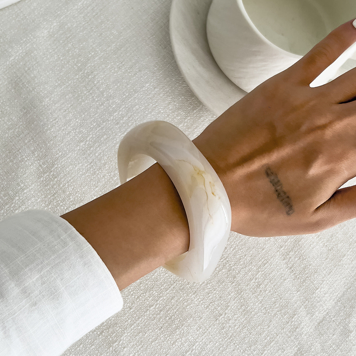 Irregular Marbled Resin Wide-Band Mirror-Finish Retro Bracelet for Women with Plated Finish