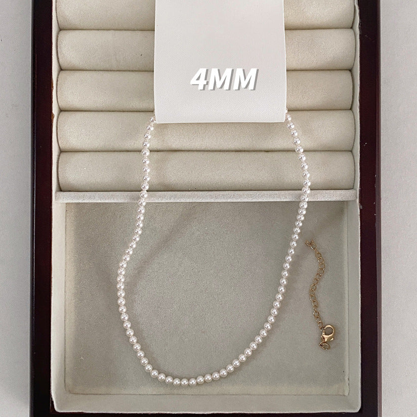 Elegante Collana da Donna Ispirata alla Francia con Perle e Pendente a U, Accenti di Perle Sintetiche e Madreperla, Finitura Placcata, Delicata Catena alla Clavicola