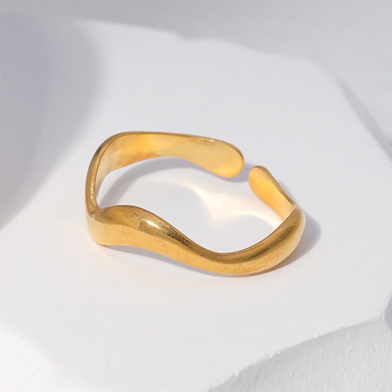 Anello Aperto Minimalista da Donna in Acciaio al Titanio a Forma di Onda con Finitura Placcata e Design a Linee Geometriche