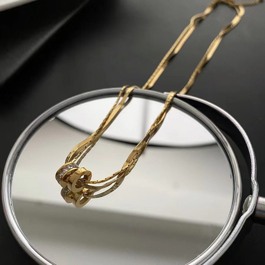 Collana pendente con quadrifoglio in acciaio al titanio placcato oro rosa 18 carati minimalista di lusso da donna