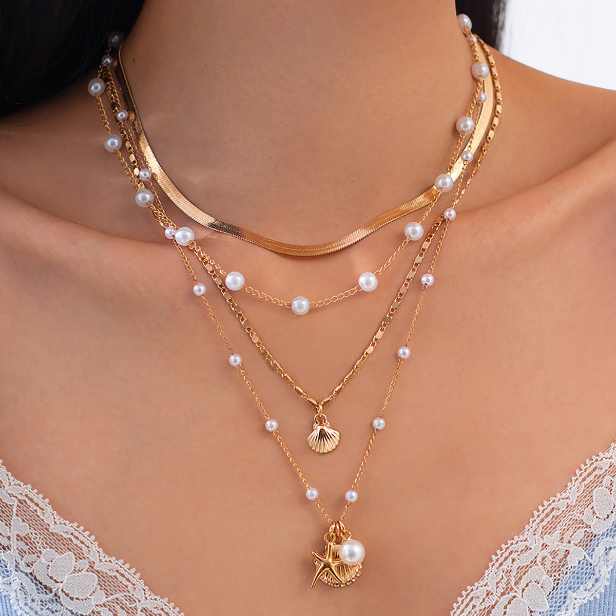 Minimalist Ocean-Inspired Star and Shell Pendant Necklace for Women with Imitation Pearl and Alloy, Plated Snake Chain