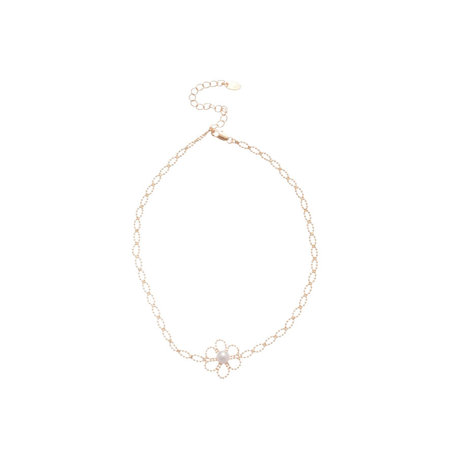 Set di collana e bracciale da donna con perle floreali a traforo minimaliste, pendente in lega e finitura placcata
