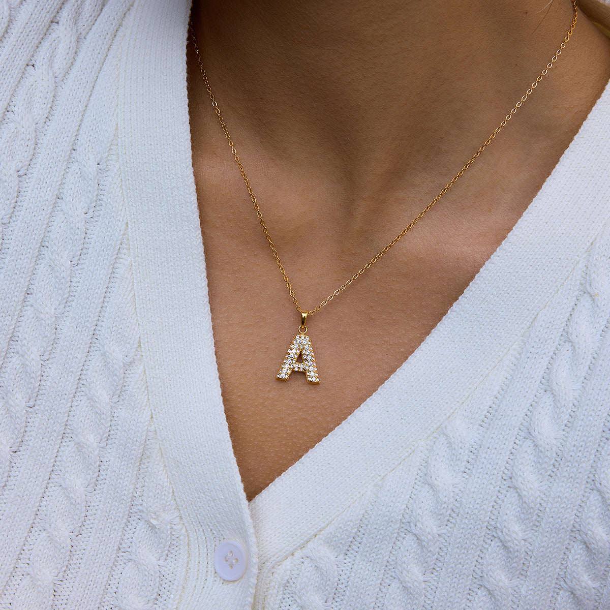 Collana da donna in acciaio inossidabile con ciondolo a cuore minimalista e finitura placcata oro