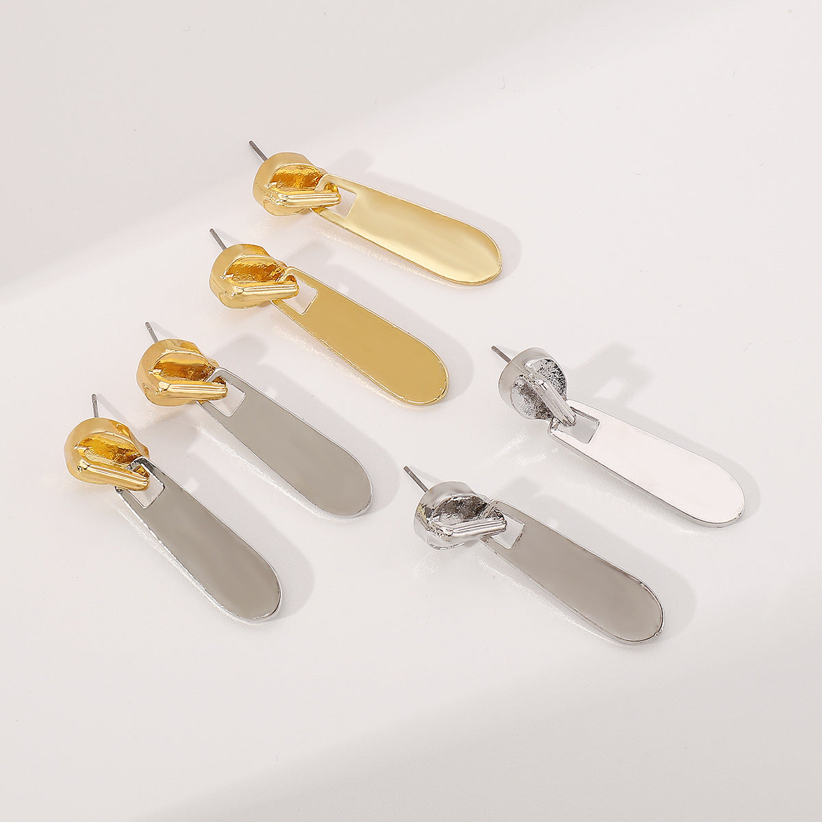 Pendientes Geométricos de Aleación con Cremallera y Acabado Galvanizado para Mujer