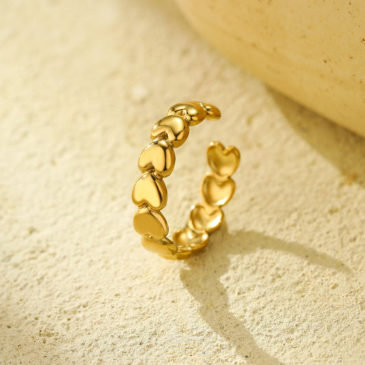 Anillo de acero inoxidable con forma de corazón, ajustable y a la moda para mujer con acabado chapado