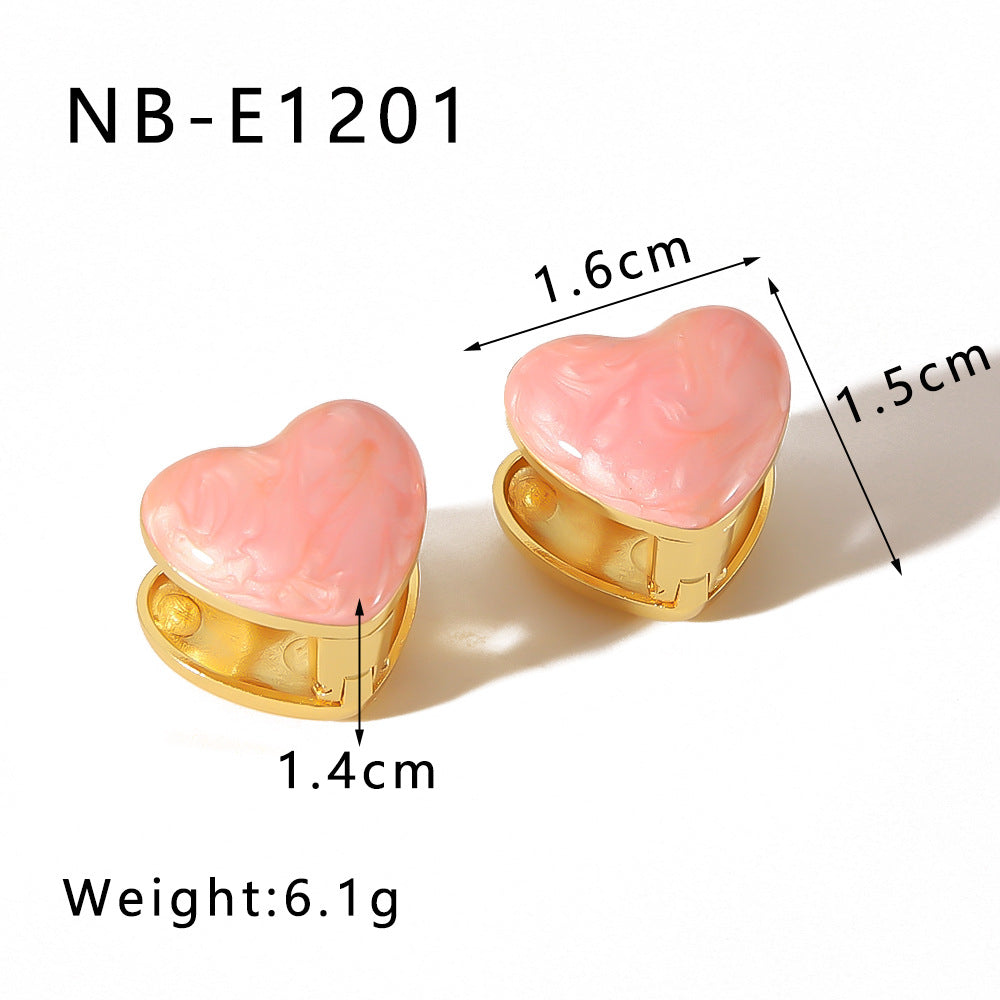 Orecchini da donna in acciaio al titanio con placcatura in oro 18 carati a forma di cuore e sfera, dal design minimalista