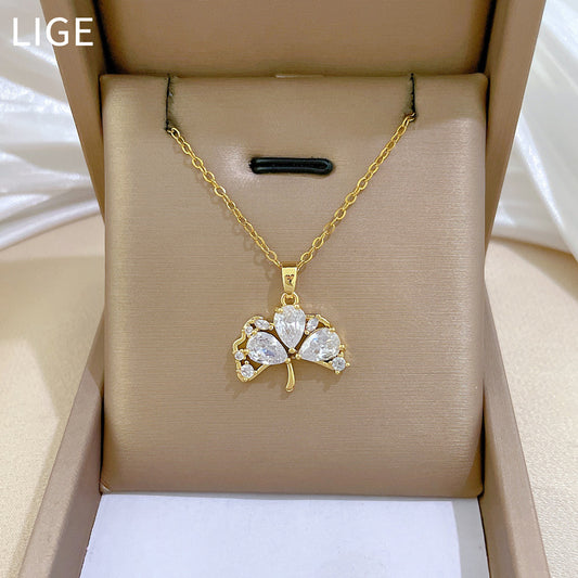Elegant Ginkgo Leaf Pendant Necklace in Titanium Steel with Full Rhinestone Inlay for Women, Delicate Clavicle Chain with Geometric and Natural Design