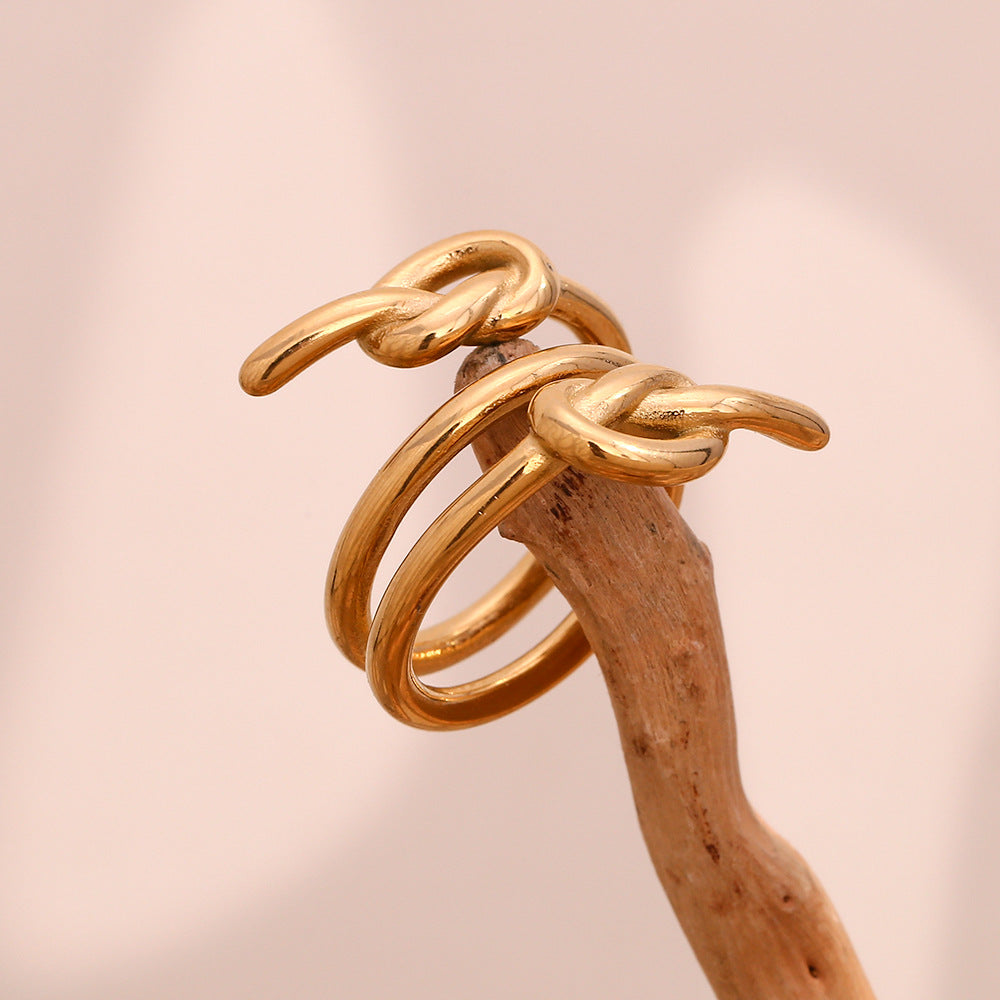 Anello creativo geometrico in acciaio inossidabile da donna, placcato oro 18 carati con design a triplo nodo