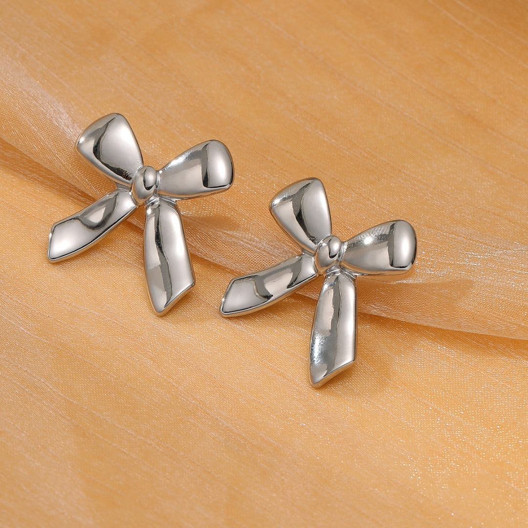Elegantes Pendientes de Acero de Titanio con Forma de Lazo Bañados en Oro para Mujer