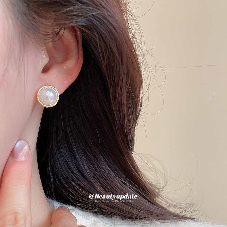 Eleganti orecchini a lobo placcati in acciaio in stile vintage con perle finte e zirconi rotondi per donna