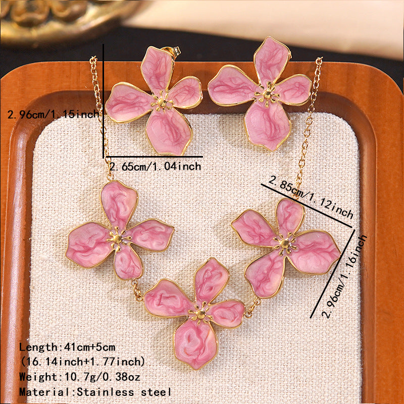 Elegante set collana e orecchini da donna in acciaio inossidabile con motivo floreale a goccia d'olio per affari