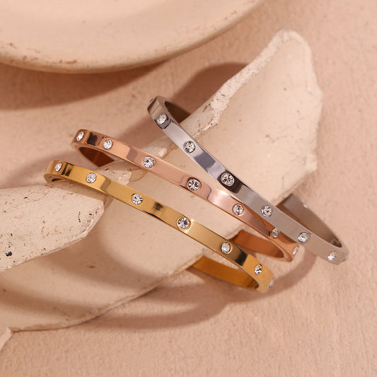 Minimalist Geometric Stainless Steel Bracelet with 18K Gold Plating Rose Gold Finish and Round Zirconia Accents