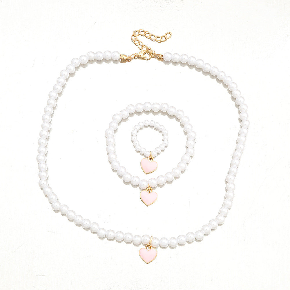 Juego de collar con colgante de aleación con forma de corazón para niñas, con cadena de perlas de agua dulce, para mayores de 6 años.