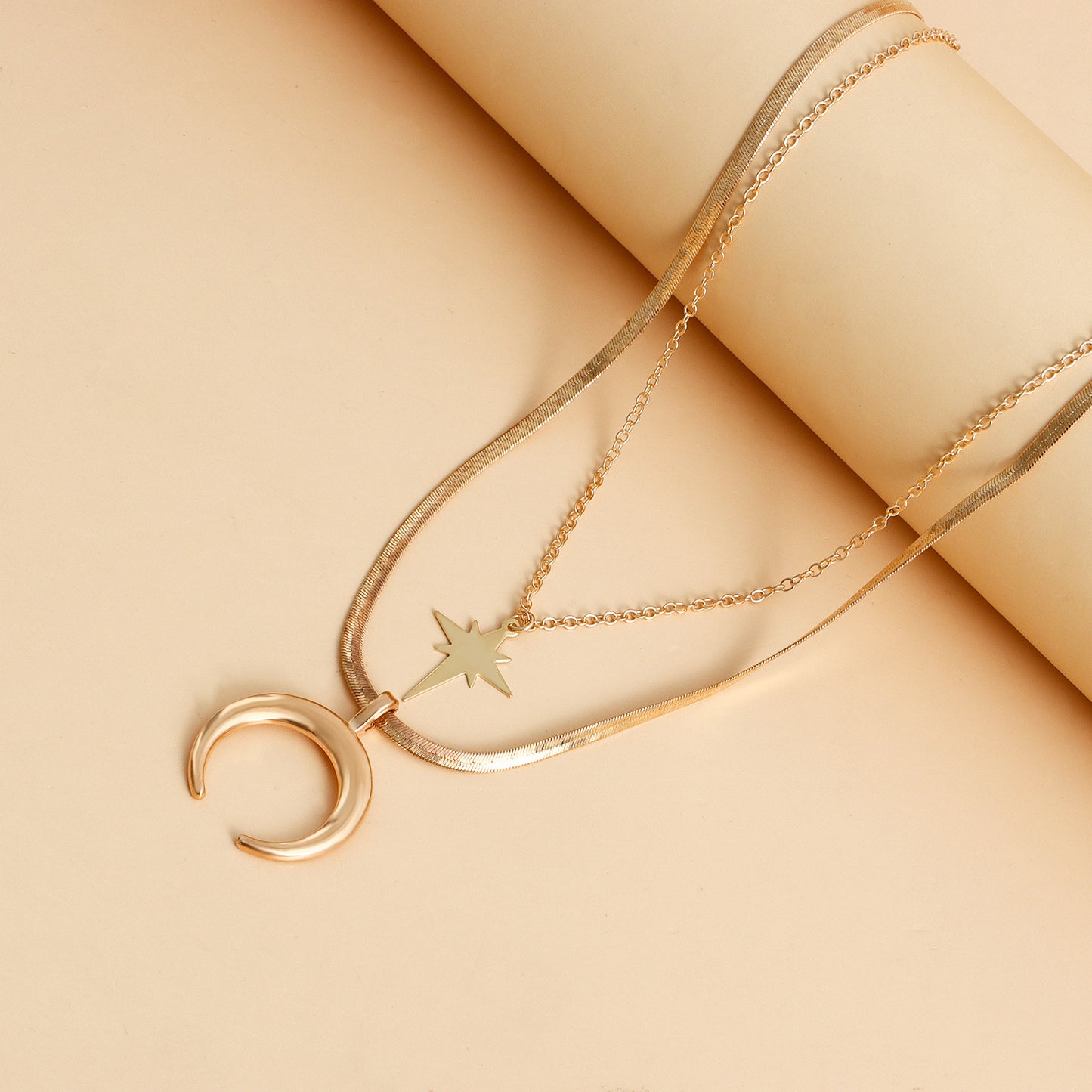 Fashionable Geometric Moon and Cross Pendant Necklace for Women with Triple-Layer Flat Snake Chain and Electroplated Alloy Finish
