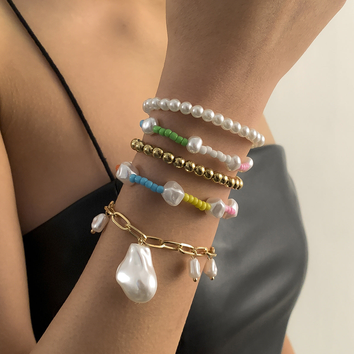 Minimalist Ethnic Geometric Imitation Pearl Bracelet for Women with Metal Chain and Tassel Details