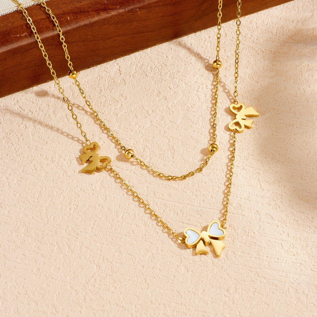 Minimalist Luxury Gold Plated Stainless Steel Bow Pendant Double Layer Necklace Set for Women
