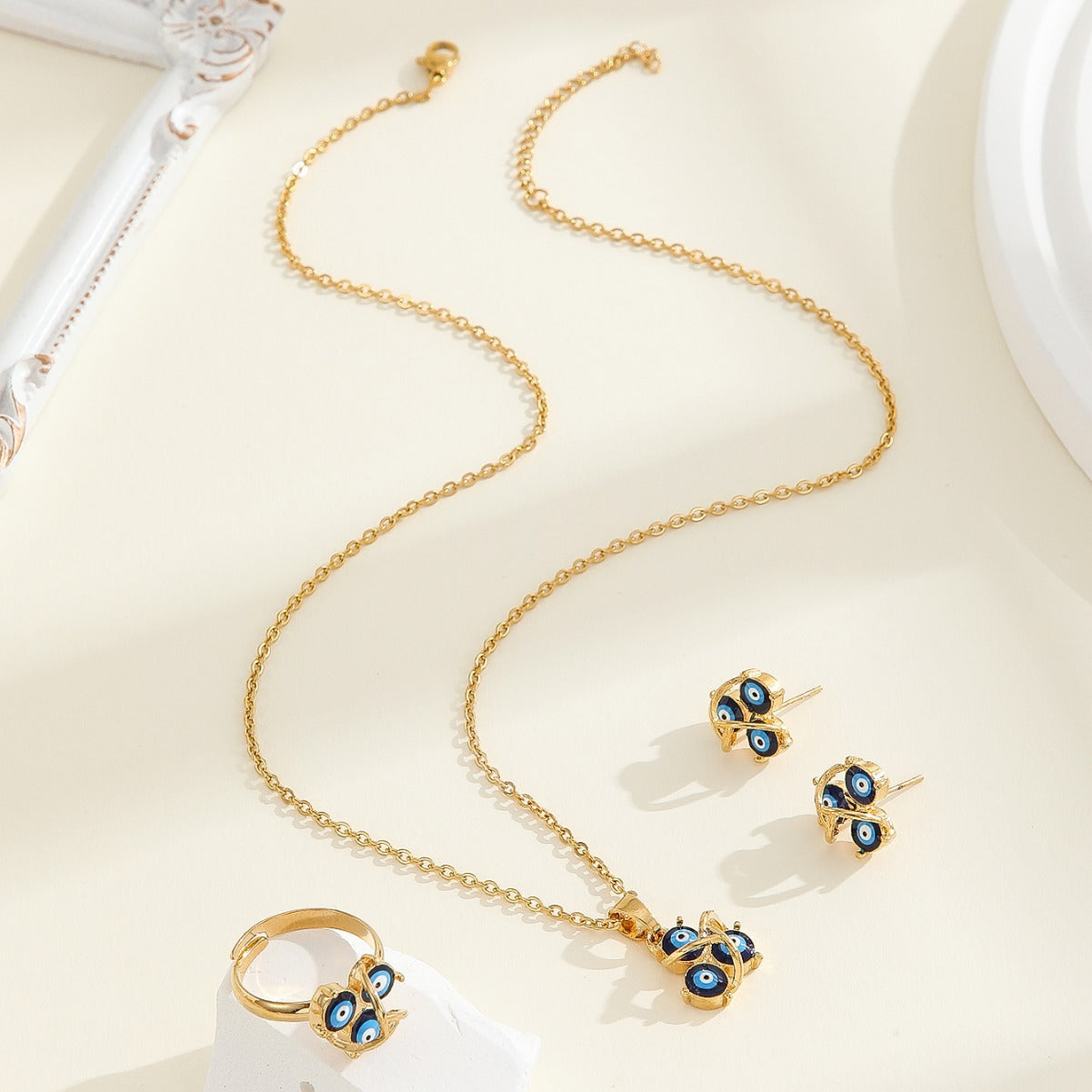 Conjunto de collar y pendientes de aleación, estilo americano minimalista y de moda, con diseño de ojo turco y acabado galvanizado, para mujer