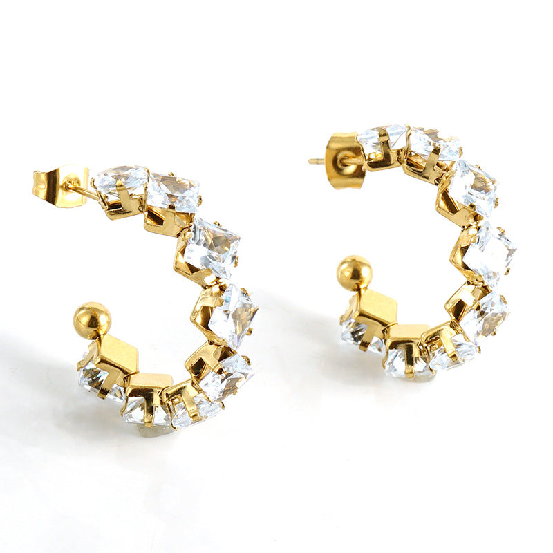 Orecchini a perno da donna alla moda geometrici in acciaio al titanio placcato oro 18K con zirconi