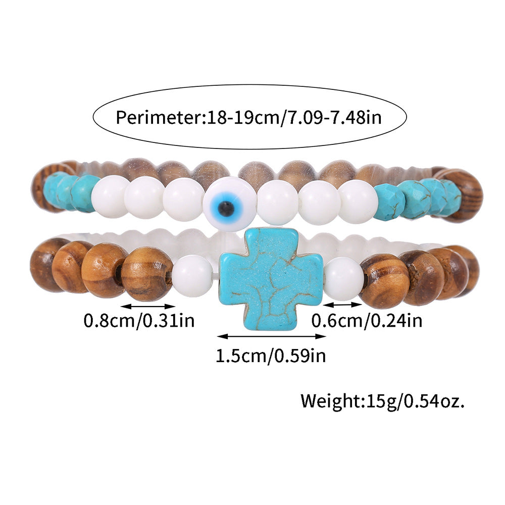 Bracciale Unisex con Perline Turchesi e in Porcellana, Perle in Legno e Ciondolo a Croce Geometrica