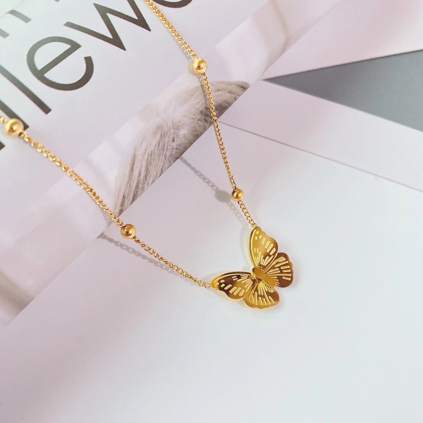 Minimalist Butterfly Pendant Necklace for Women in Titanium Steel with O-Chain Design