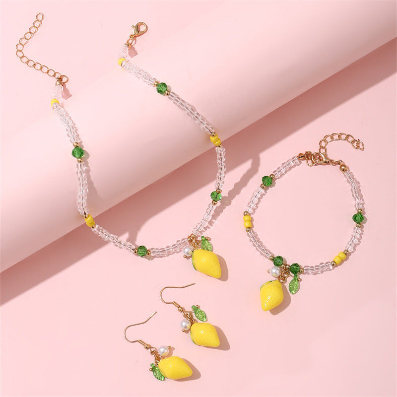 Set di collane con ciondoli a forma di fiocco, ciliegia, uva, frutta e stella marina in resina per bambine con catena di perline