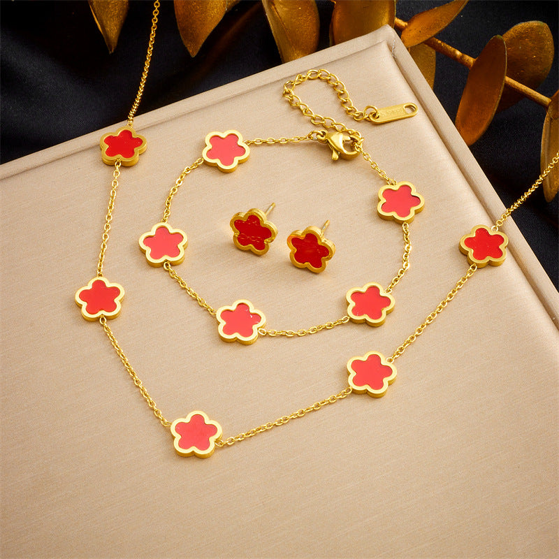 Set de pendientes, pulsera y collar chapados en acero inoxidable con diseño de flores vintage de cinco pétalos para mujer