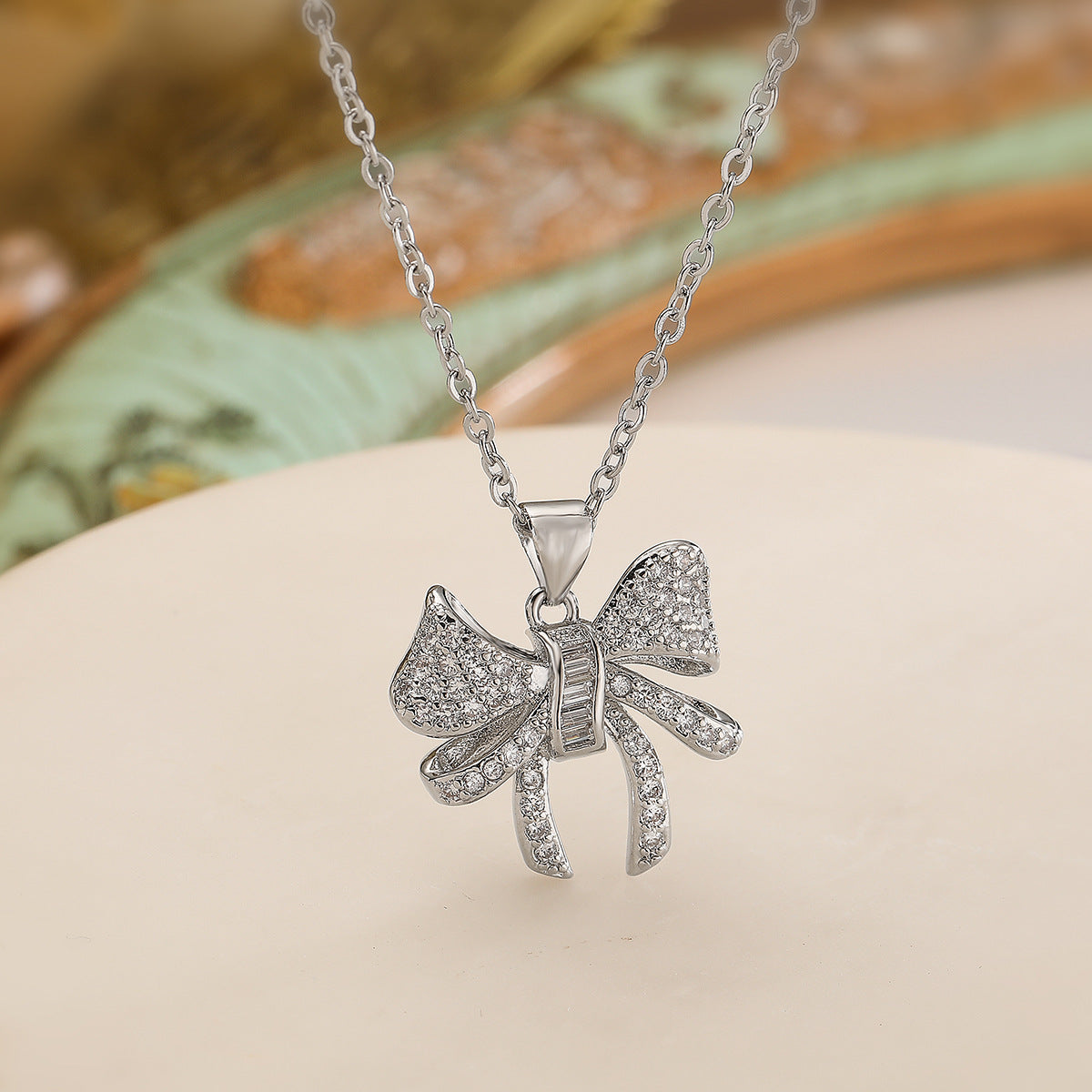 Minimalist Bowknot Pendant Necklace for Women with Copper Base Plated in Real Gold and Zirconia Accents