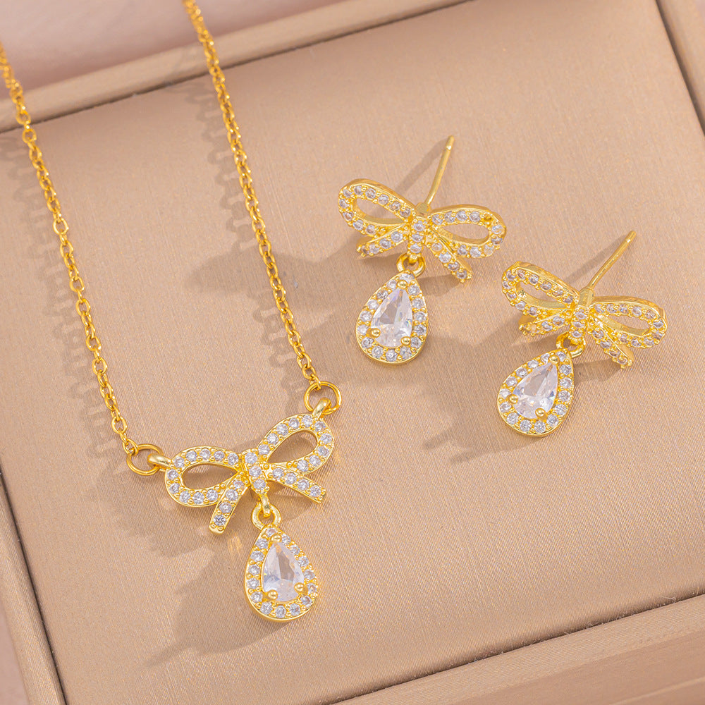 Sweet Bow Heart Pendant Necklace Set with Zircon Inlay in Titanium Steel with O-Chain for Women