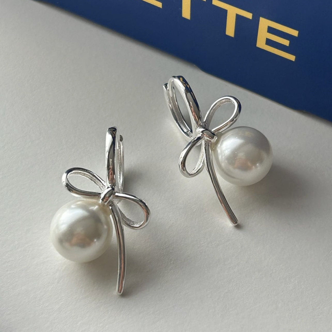 Minimalist Bow Knot Stud Earrings in 925 Sterling Silver with Geometric Edge Detail