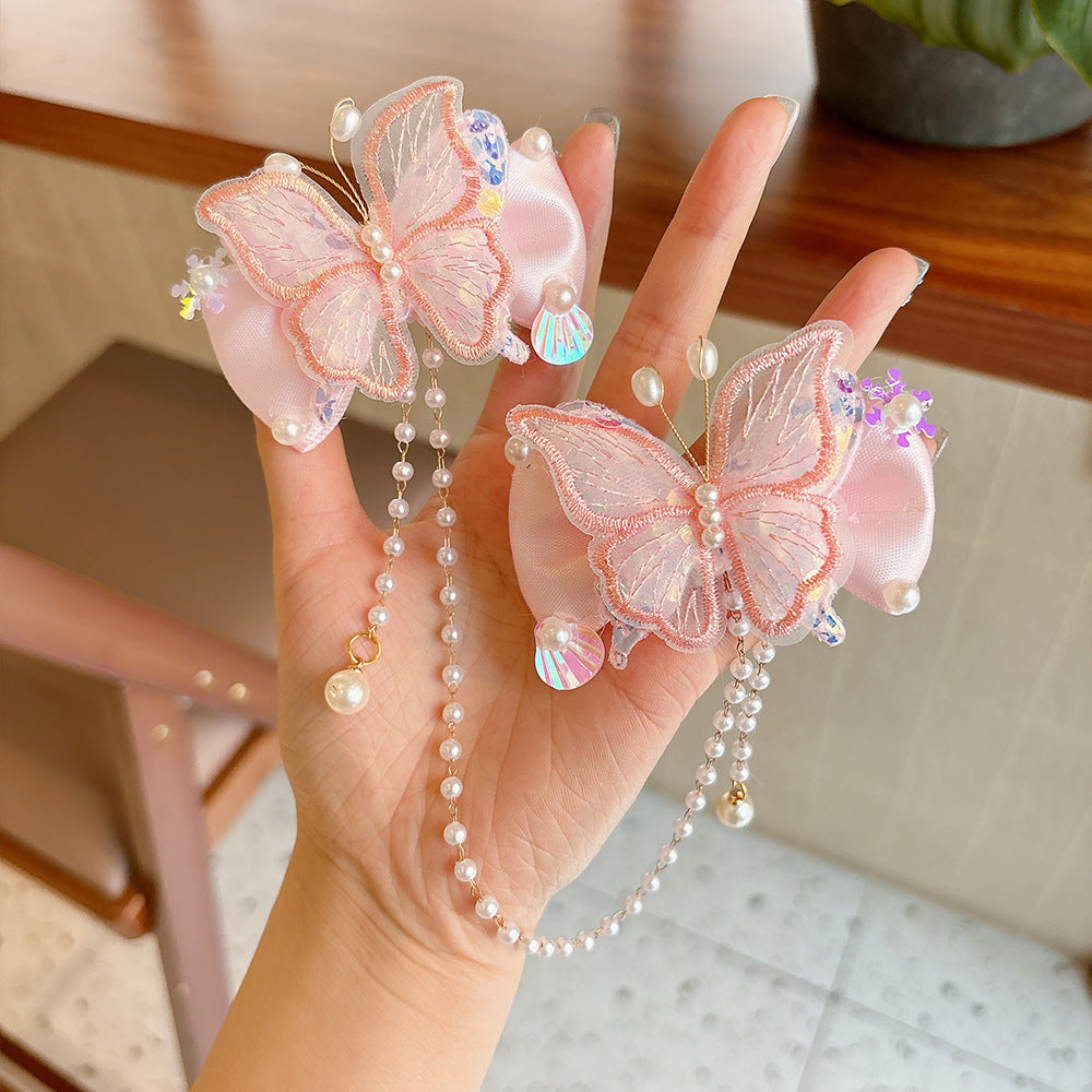 Lindos clips de pelo con diseño de mariposa estilo princesa para niñas con detalles de perlas y borlas, diseño de lazo de tela, set de pinzas laterales hecho a mano para niñas