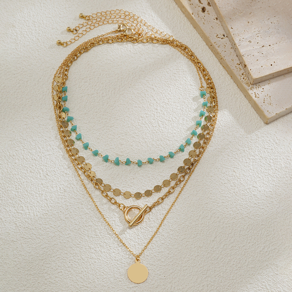 Collana Pendente Multistrato da Donna Fatta a Mano in Metallo Misto Stile Turchese Geometrico Minimalista con Frange e Catena Snake