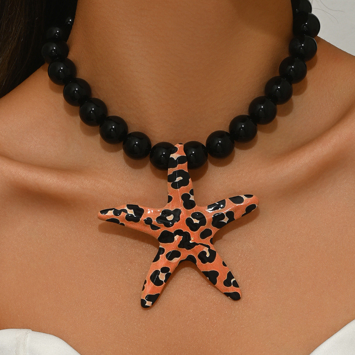 Collana da donna alla moda con perle a forma di stella e lega, con design geometrico e catena a lunghezza clavicola