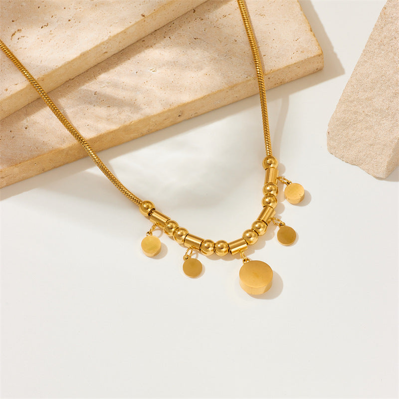 Collana girocollo minimalista geometrica rotonda da donna in acciaio al titanio con intarsio di strass e finitura placcata