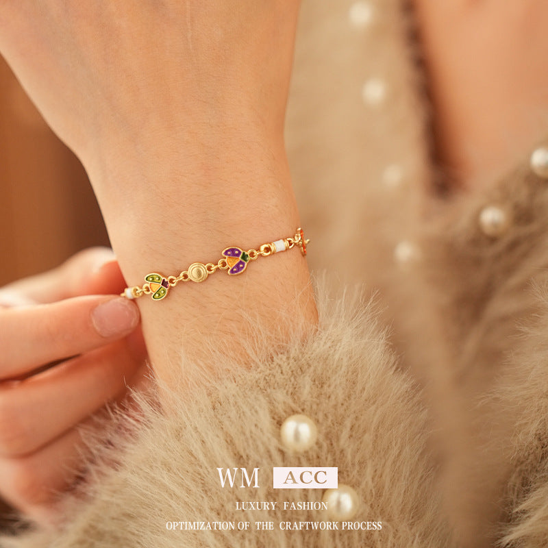 Bracciale vintage da donna con motivo floreale geometrico in lega e smalto, elegante gioiello di lusso