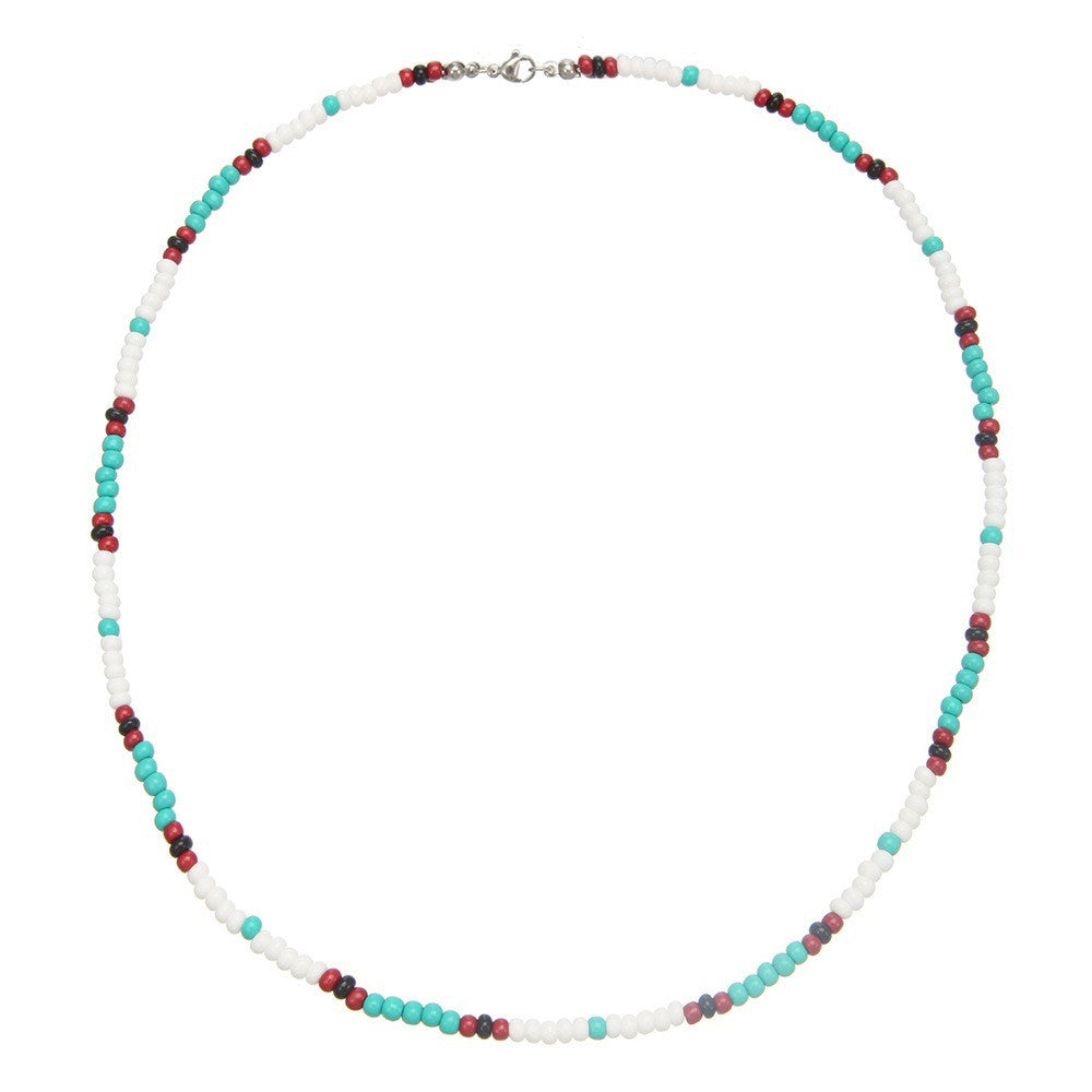Collana con ciondolo a margherita minimalista con accenti di turchese e perle su catena a maglia per donna
