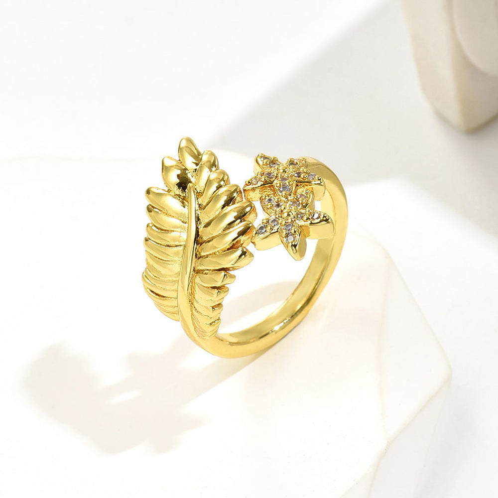 Anello da donna a forma di fiore a foglia geometrica in rame con placcatura in oro 18 carati e zirconi micro-pavé