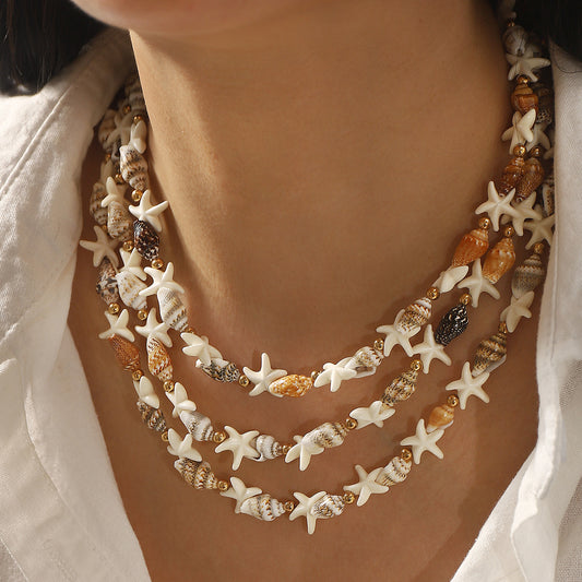 Juego de collares de concha de mar en forma de estrella bohemia y colgante de estrella para mujer con cadena de aleación y detalles de resina