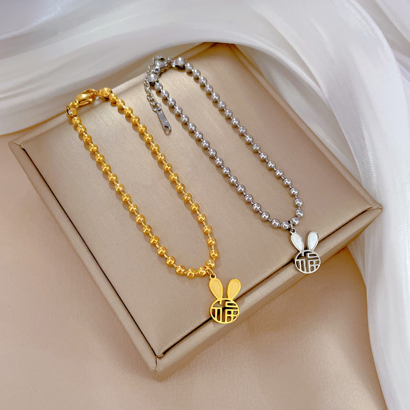 Vintage Korean-Inspired Titanium Steel Rabbit and Chinese Character Fu Pendant Bracelet for Women with Gold Plating and Wavy Texture
