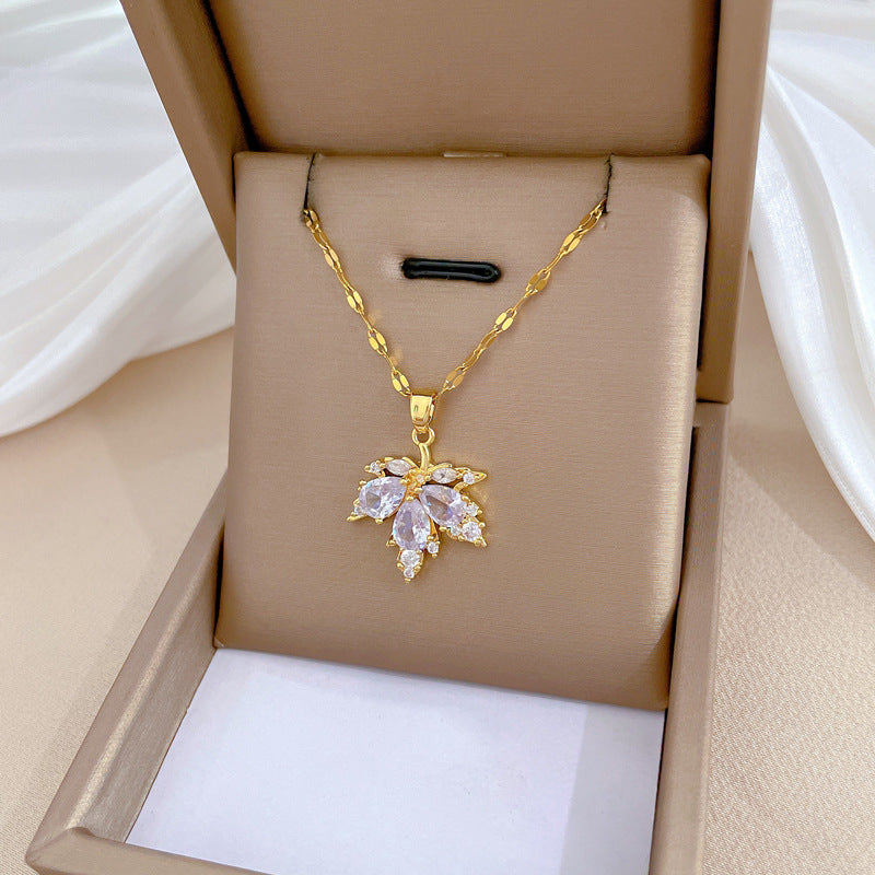 Luxury Plated Titanium Steel Geometric Maple Leaf Necklace and Earrings Set