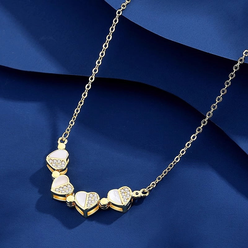 Collana con ciondolo a trifoglio dal design originale con ciondolo a cuore separabile in acciaio al titanio con finitura placcata su catena a O per donna e unisex