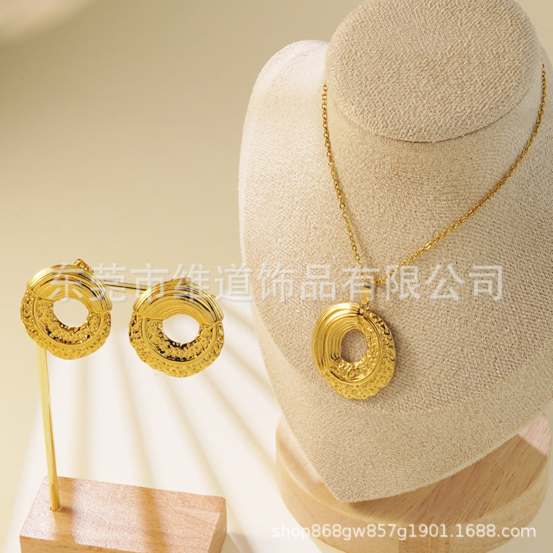 Conjunto de joyas de acero inoxidable con baño de oro minimalista con colgante de corazón floral y lazo en cadena para mujer