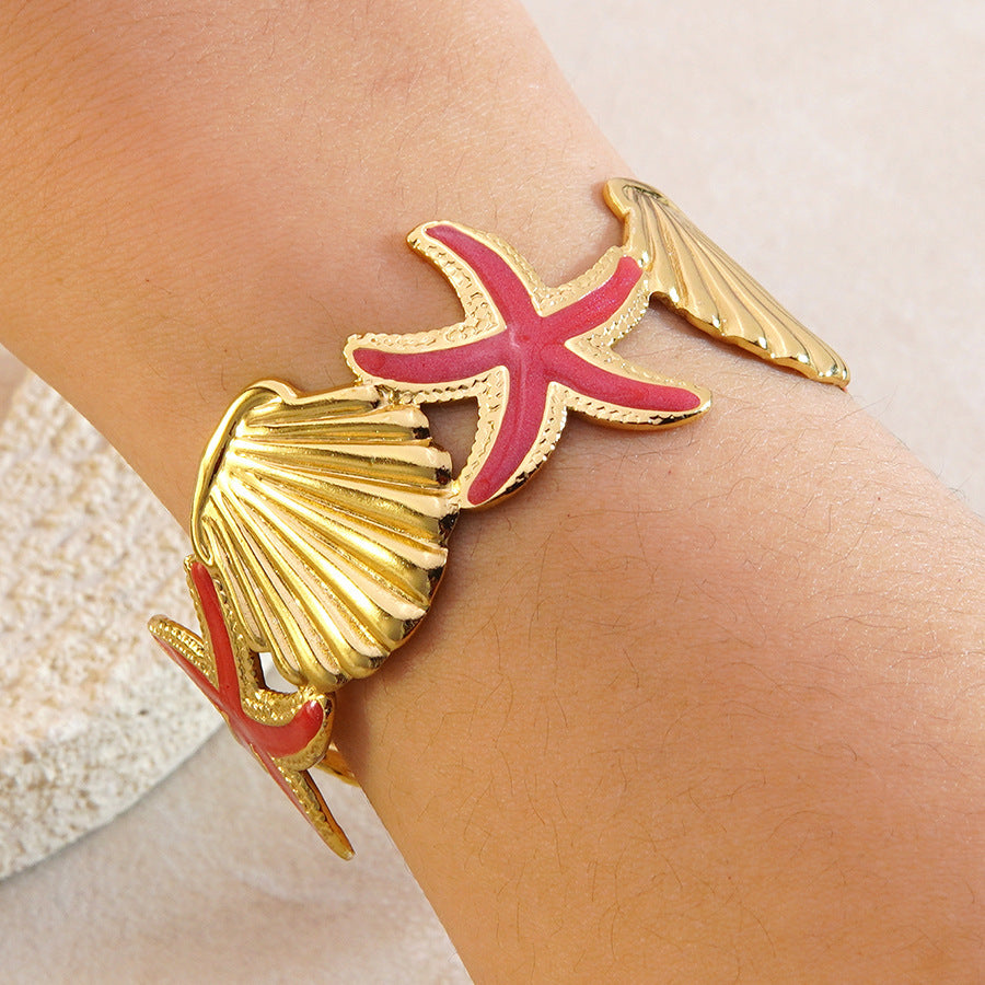 Bracciale a polsino in acciaio inossidabile con gocciolamento casuale, stella marina e conchiglia