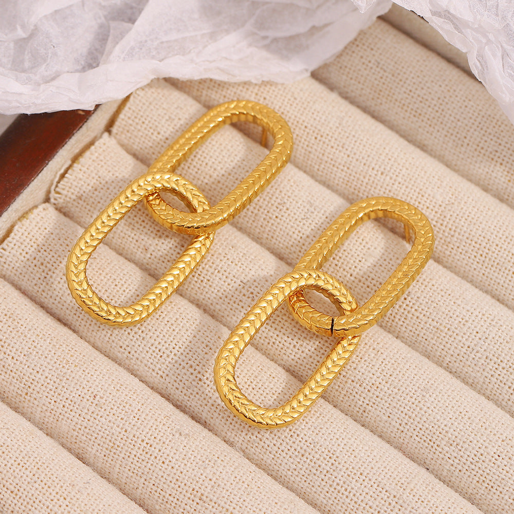 Orecchini minimalistici moderni geometrici in acciaio inossidabile con placcatura in oro 18 carati e doppio cerchio testurizzato a pelle di serpente