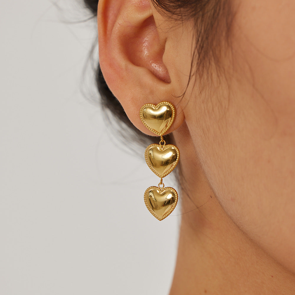 Pendientes de borla en forma de corazón de acero inoxidable con baño de oro de 18 quilates de moda con diseño de borde en capas para mujer