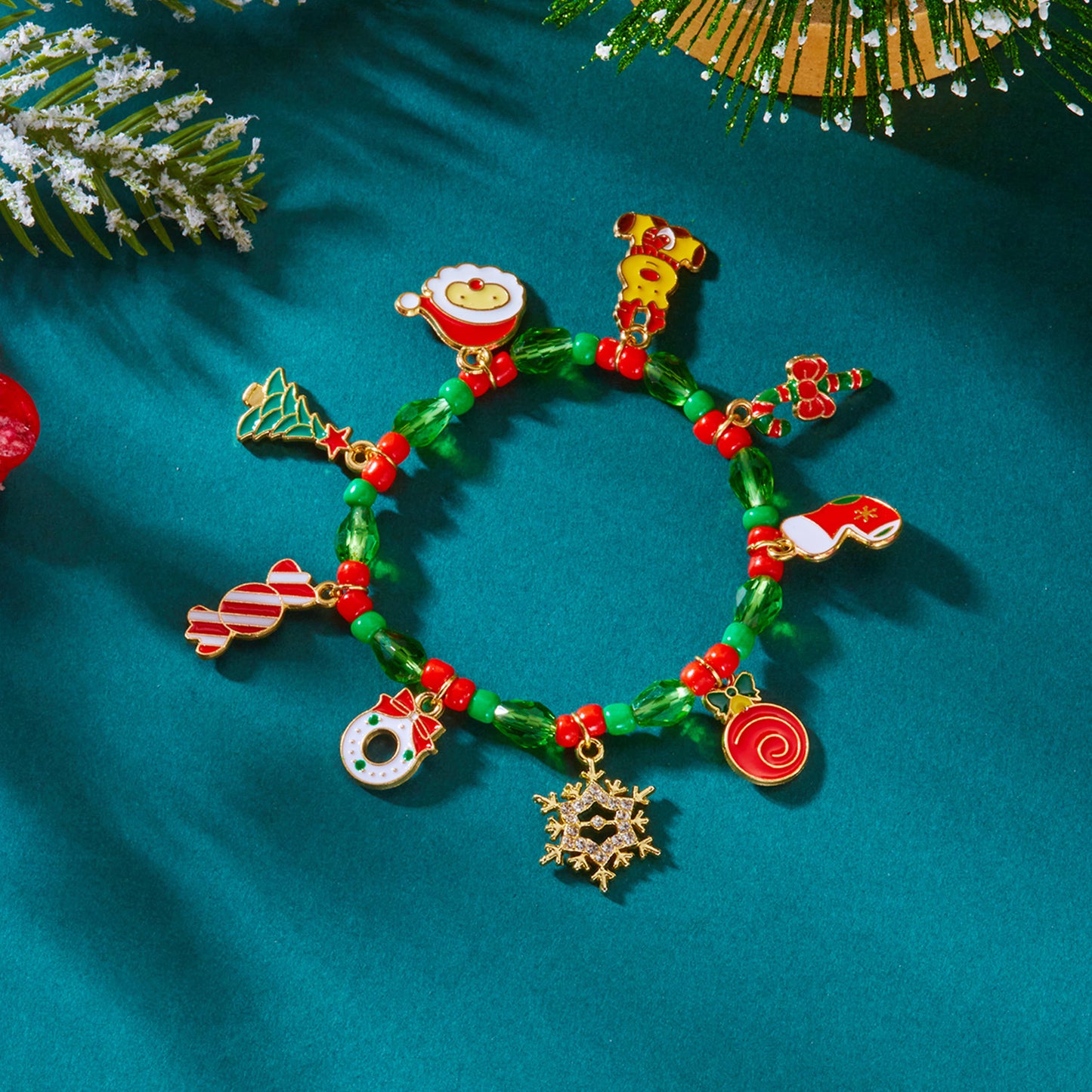 Bracciale con ciondolo a fiocco di neve, renna e bastone di Babbo Natale in lega fatta a mano, con cristalli, gioiello natalizio per donna