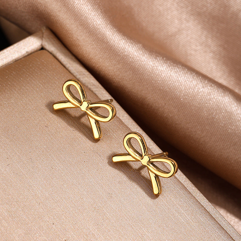 Parure collana e orecchini a fiocco da donna in acciaio inossidabile placcato oro 18 carati, stile minimalista